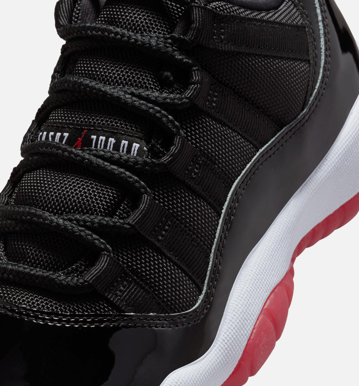Air Jordan 11 Retro Bred Grade School Lifestyle Shoes - Black / Varsity Red / White